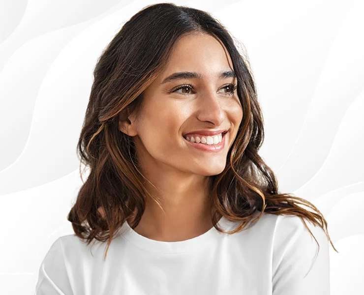 Young woman in white t-shirt smiling | Treatments | Interventional Spine and Pain Associates